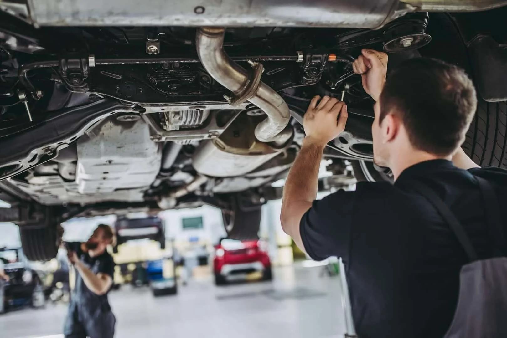 Technician servicing a vehicle at Albany Motorcars